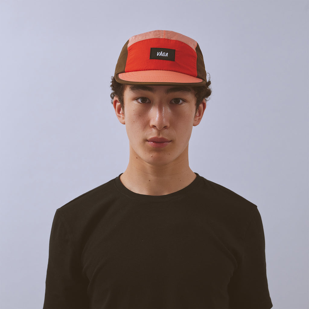 Pacer Cap - Flame Red / Coral / Brown — VÅGA running cap — worn, alternate angle