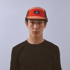 Pacer Cap - Flame Red / Coral / Brown — VÅGA running cap — worn, alternate angle