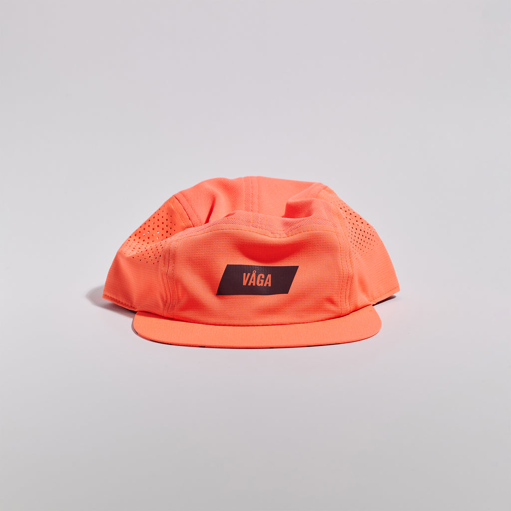 Feather Racing Cap - Neon Coral — VÅGA running cap — front view