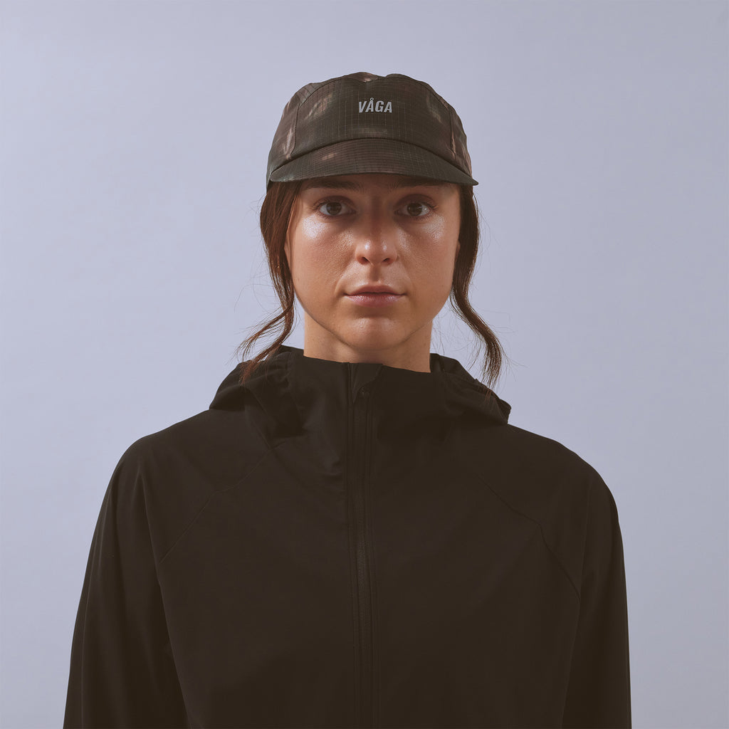Night Club Cap 2.0 - Ember — VÅGA running cap — worn, front view
