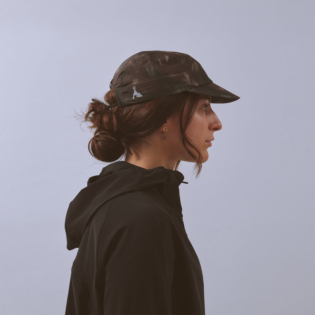 Night Club Cap 2.0 - Ember — VÅGA running cap — worn, side profile