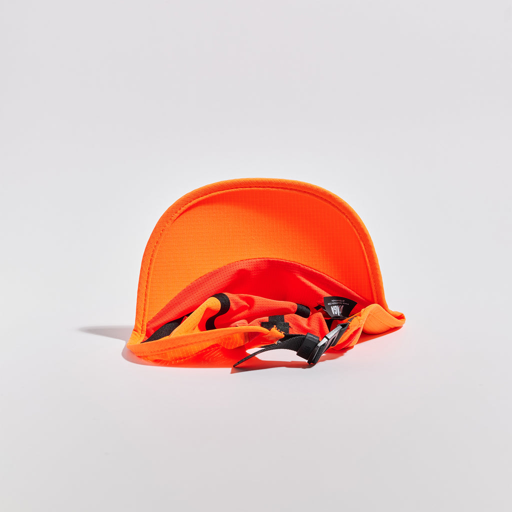 Transit Lite Cap - Neon Orange / Coral — VÅGA running cap — underside