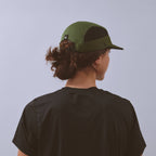 Club Cap - Utility Green / Black — VÅGA running cap — worn, back angled view