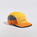 Club Cap - Yellow / Amber / Charcoal — VÅGA running cap — front angled view