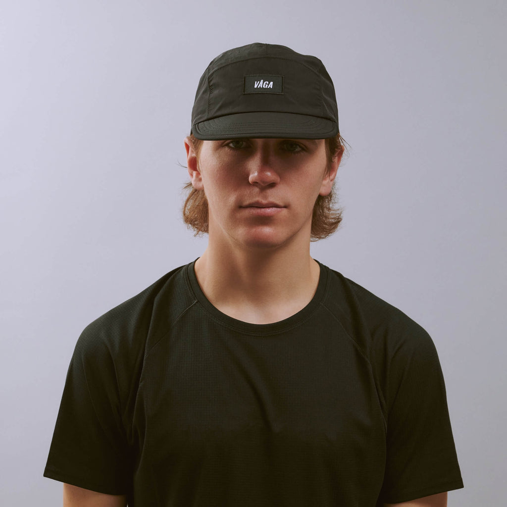 Pacer Cap - Storm Black — VÅGA running cap — worn, front view