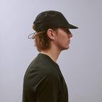 Pacer Cap - Storm Black — VÅGA running cap — worn, side profile